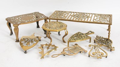 Lot 29 - Group of Brass Trivets and Footmen