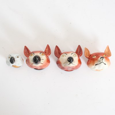 Lot 370 - Group of Four Fox Stirrup Cups