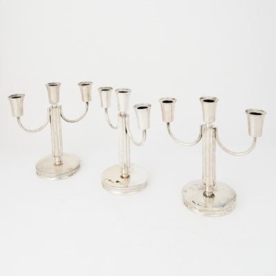 Lot 77 - Suite of Three Continental Silver Three-Light Candelabra