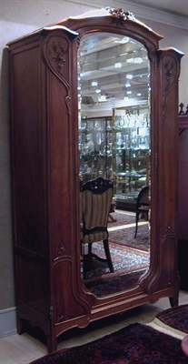 Lot 471 - Art Nouveau Walnut Armoire The arched crest...