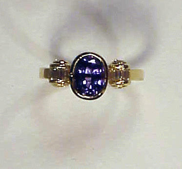 Lot 177 - Tanzanite and Diamond Ring 18 kt. yellow gold,...