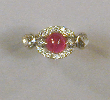 Lot 509 - Cabochon Ruby and Diamond Ring Platinum,...