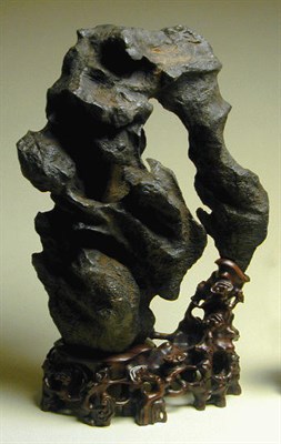 Lot 187 - Arching Dark Gray Lingbi Pierced wood base...