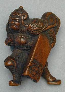 Lot 93 - Boxwood Netsuke of Hankai Carrying a Palace...