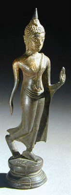Lot 18 - Small Thai Bronze of a Walking Buddha...