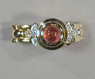 Lot 24 - Gold, Pink Tourmaline and Diamond Ring The 14...