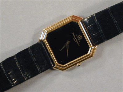 Lot 155 - Lady's Gold Wristwatch The black leather band...