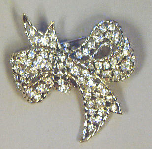 Lot 214 - Rhinestone Bow Pin Variegated rhinestones set...