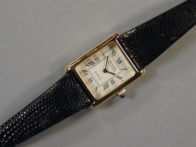 Lot 41 - Lady's Gold Quartz Wristwatch The leather band...