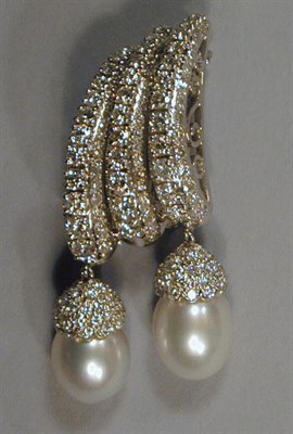 Lot 561 - Diamond and South Seas Cultured Pearl Brooch...
