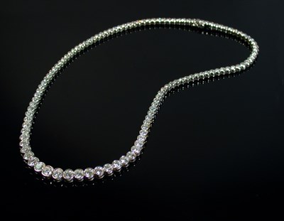 Lot 456 - Gold and Diamond Necklace 18 kt. white gold,...