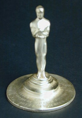 Lot 30 - Miniature Academy Awardc Statuette Lead....