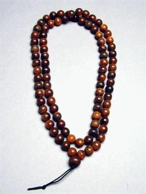 Lot 177 - Rhinoceros Horn 87-Bead Necklace The 87th bead...