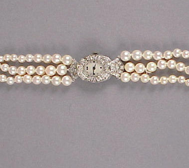 Lot 44 - Lady's Platinum, Cultured Pearl and Diamond...
