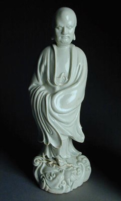Lot 227 - Dehua White Porcelain Figure of Bodhidharma...