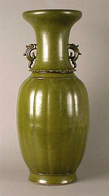 Lot 209 - Lobed Teadust Vase 19th Century The ovoid body...