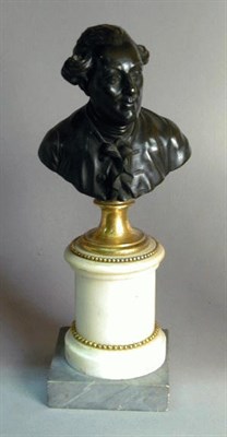 Lot 518 - Bronze Bust of a Man Raised on a marble...