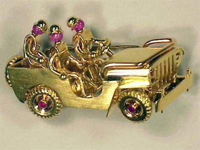 Lot 170 - 14 Kt. Gold Jeep Pin Three soldiers in jeep...