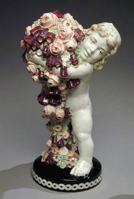 Lot 262 - Austrian Pottery Figure Depicting a cupid...