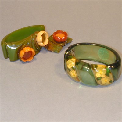 Lot 602 - Two Bakelite Hinged Bracelets One reverse...
