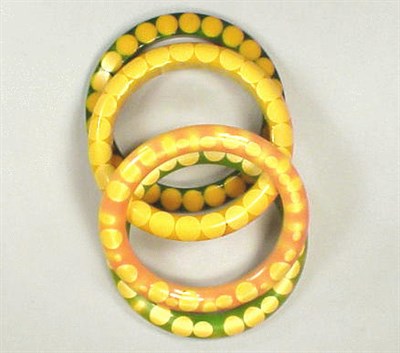 Lot 279 - Group of Four Gumdrop and Bow Tie Bracelets...