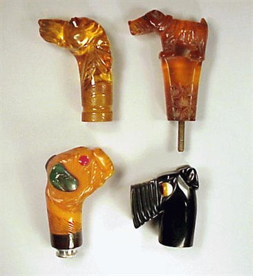 Lot 267 - Group of Four Bakelite Umbrella Handles Each...