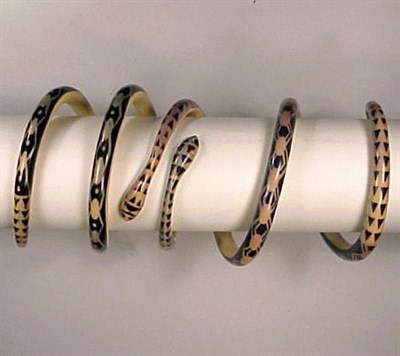 Lot 292 - Two Celluloid Painted Arm Bracelets Each of...