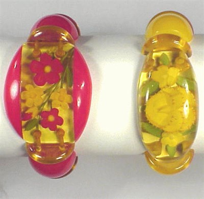 Lot 269 - Two Bakelite Reverse Carved and Painted...