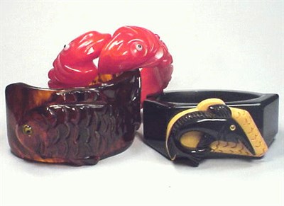 Lot 270 - Group of Three Bakelite Bracelets Each with...