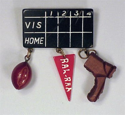 Lot 304 - Bakelite, Celluloid and Wood Brooch Depicting...