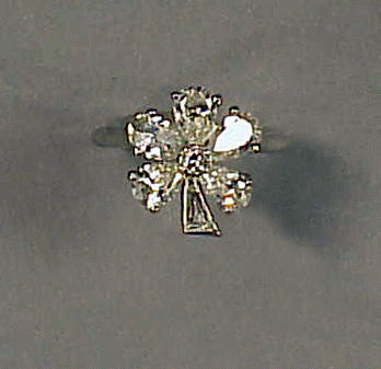 Lot 415 - Diamond Flower Ring Platinum, designed as a...