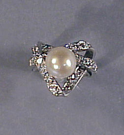 Lot 339 - Cultured Pearl and Diamond Ring Platinum,...