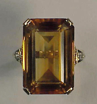 Lot 78 - Retro Citrine and Diamond Ring 14 kt. yellow...