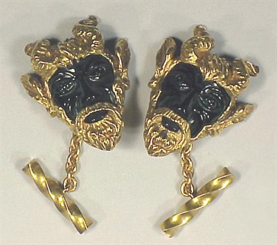 Lot 206 - Pair of Gold and Black Onyx Cufflinks 14 kt....