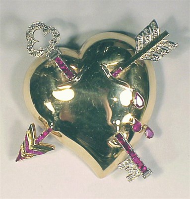 Lot 207 - Gold, Ruby and Diamond Pin 14 kt. yellow gold,...