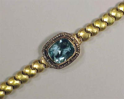 Lot 249 - Gold and Aquamarine Bracelet The 14 kt. yellow...