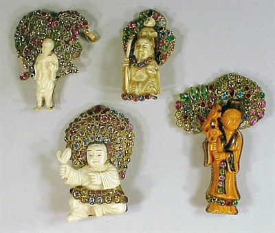 Lot 258 - Four Hobe Oriental Figure Pins Set in...