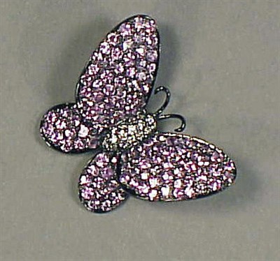 Lot 227 - Diamond and Sapphire Butterfly Pin 18 kt....