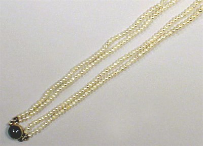 Lot 222 - Seed Pearl Necklace The double strand composed...