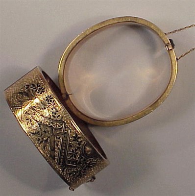 Lot 223 - Pair of Gold and Black Enamel Bracelets 9 kt....