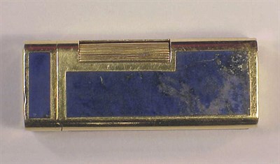 Lot 307 - Gold and Lapis-Lazuli Cigarette Lighter 18 kt....