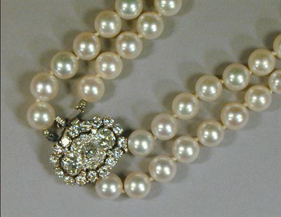 Lot 563 - Cultured Pearl Necklace with Diamond Clasp The...