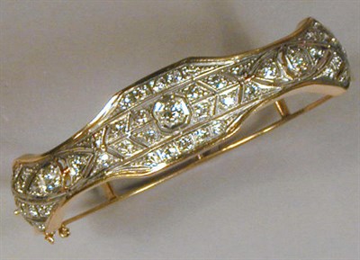 Lot 471 - Gold and Diamond Bangle Bracelet The 14 kt....