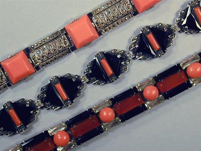 Lot 143 - Three Art Deco Bracelets The first coral,...