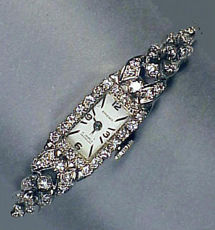 Lot 135 - Lady's Diamond Wristwatch The 14 kt. white...