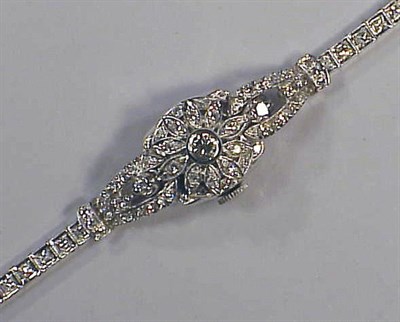 Lot 287 - Lady's Diamond Covered Wristwatch 14 kt. white...