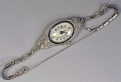 Lot 221 - Lady's Diamond Wristwatch Platinum, the...