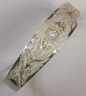 Lot 115 - Gold and Diamond Filigree Bangle Bracelet 14...
