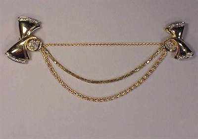 Lot 182 - Gold and Diamond Sweater Pin 18 kt. yellow...