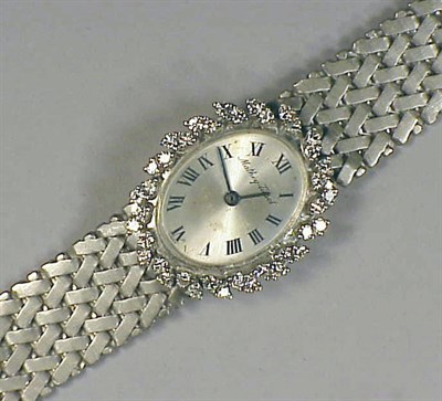 Lot 198 - Gold and Diamond Wristwatch 14 kt. white gold,...
